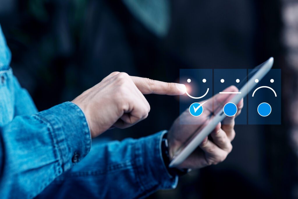 A man giving positive feedback on a phone