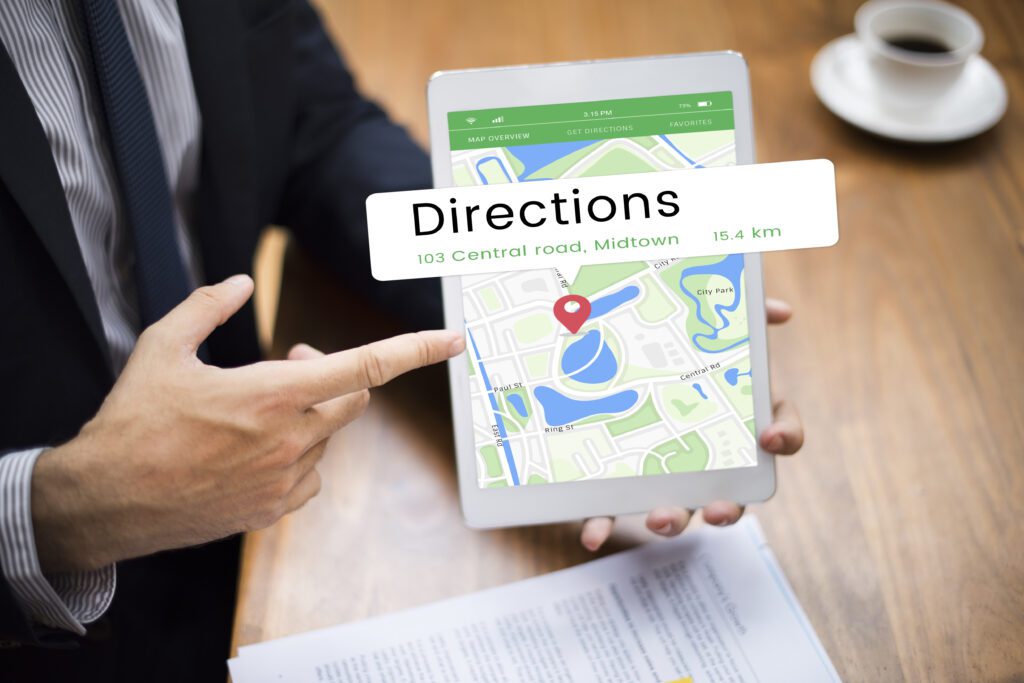 A man directing GPS Location indication on a tablet